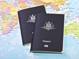 Australian Passport With the World map in the Background representing Family Australian visa