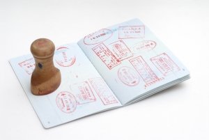 A passport with many stamps