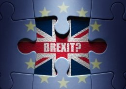 Missing piece from a European jigsaw puzzle revealing British flag and Brexit question symbolising emigrating after Brexit