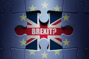 Missing piece from a European jigsaw puzzle revealing British flag and Brexit question symbolising Spanish property markets after Brexit