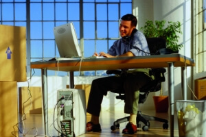A man working from home talking on the phone