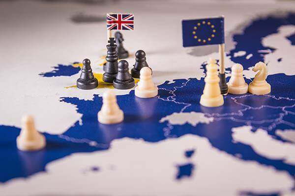 Chess pieces over an european map. 6 months to go