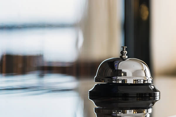 Service bell on reception in hotel or restaurant - Halo Financial