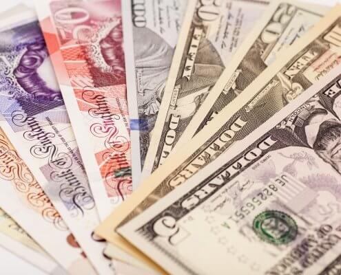 GBPUSD cash banknotes on white background