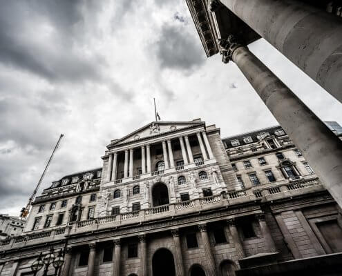 Bank of England facade seen from below in a grey tone