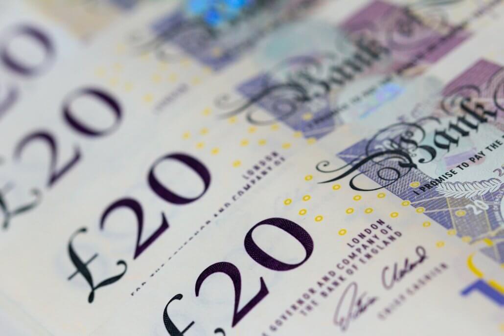 A close up image of twenty pound notes