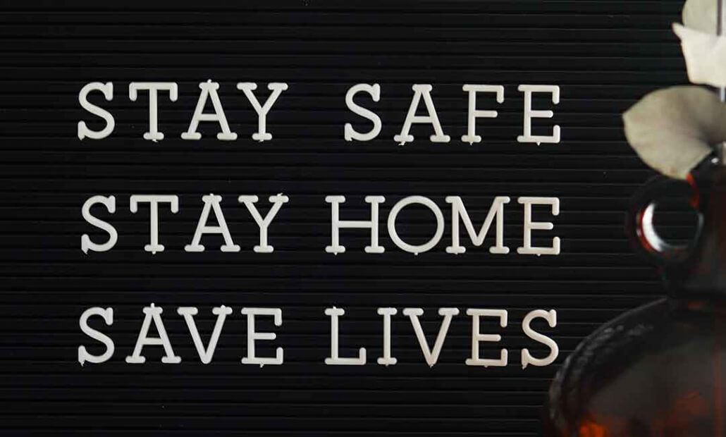 stay safe stay home save lives poster as UK government extended lockdown