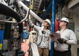 image of two people employed in the manufacturing industry