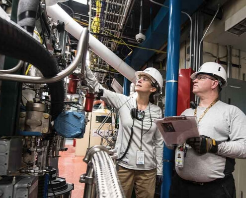 image of two people employed in the manufacturing industry