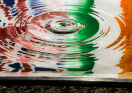 reflection of Italy and Britain flag in water