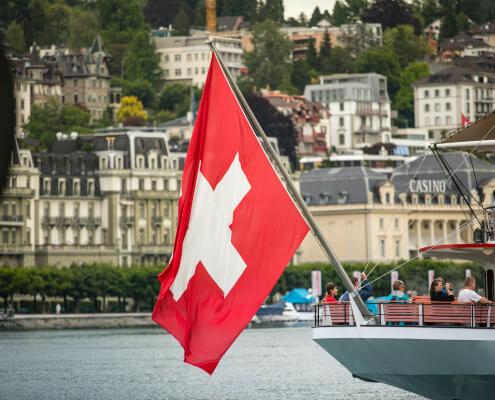 Switzerland flag hoisted on a ship
