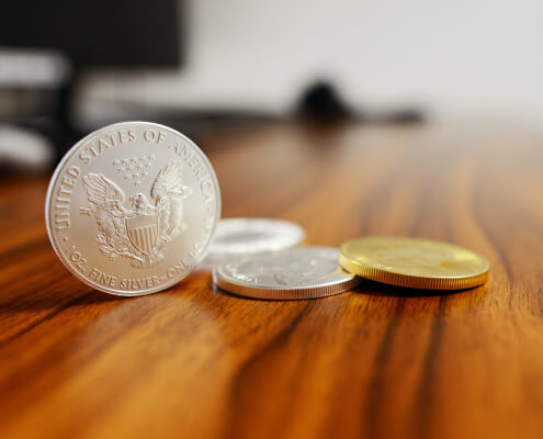 US dollar denominations coins on table