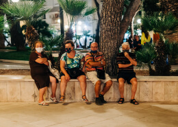 four old people wearing face mask