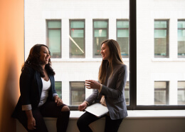 two women enjoying the conversation