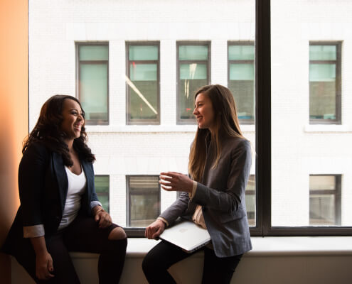 two women enjoying the conversation