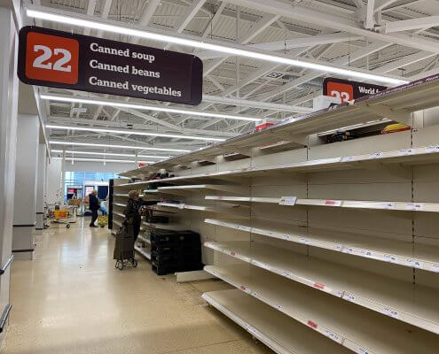 empty shelves of supermarket