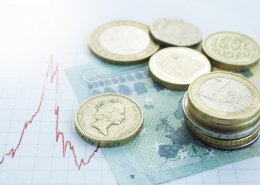 Euro coins piles on Europe map with British pound sterling coins Brexit crisis