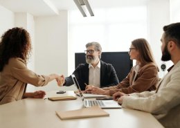 businessman having handshake in a group discussion meeting