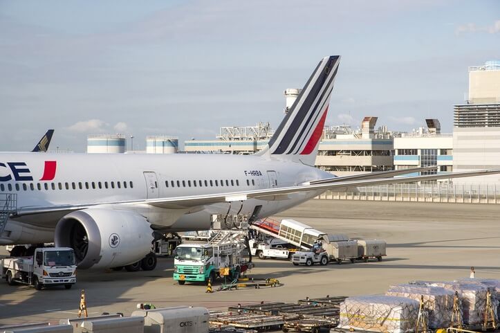 unloading from an airplane on runway