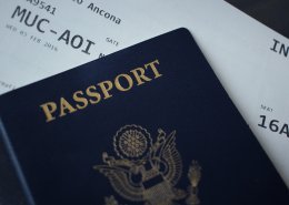 passport and travel ticket