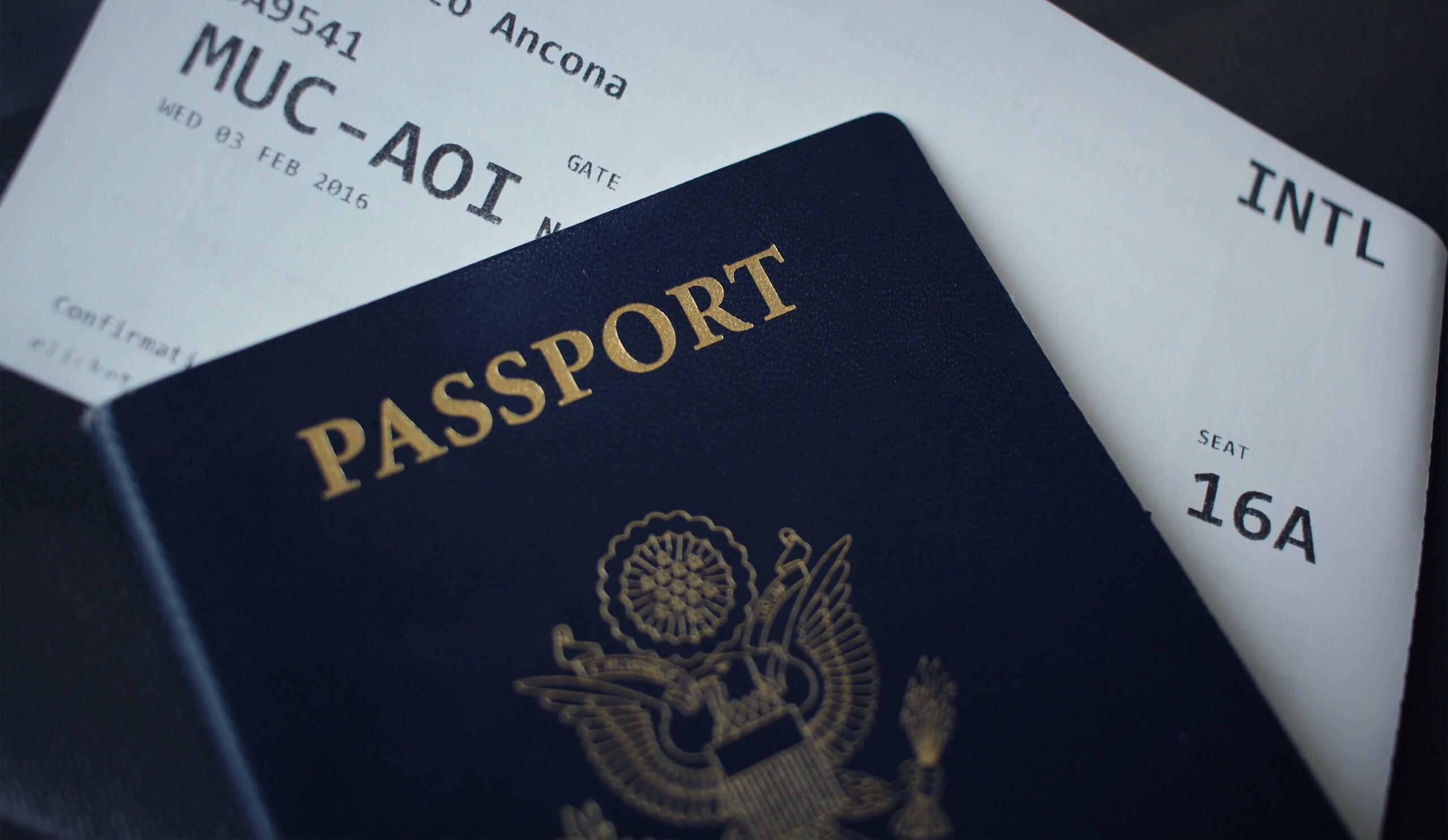passport and travel ticket