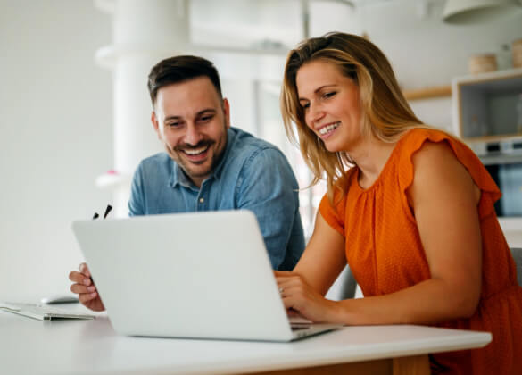 couple using laptop