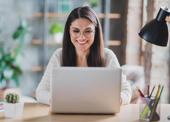 woman checking the laptop screen